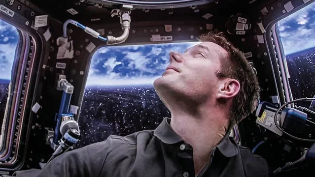 Affiche du film : Dans les yeux de Thomas Pesquet et autres aventures spatiales