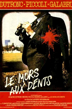 Affiche du film : Le mors aux dents