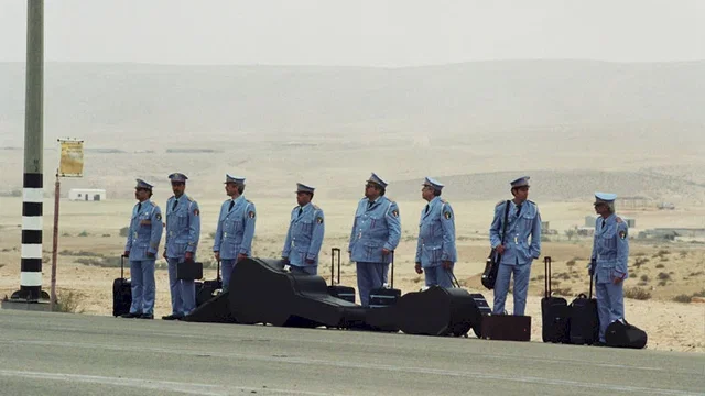 Photo du film : La visite de la fanfare