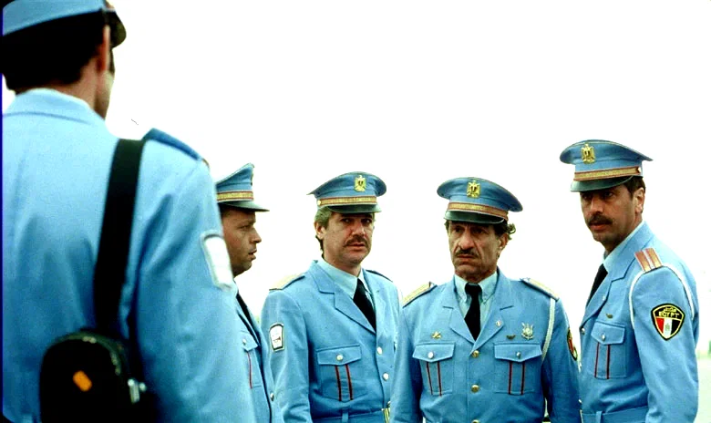 Photo 4 du film : La visite de la fanfare