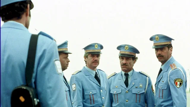 Photo du film : La visite de la fanfare