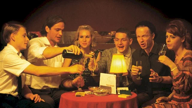 Photo du film : Le perroquet rouge