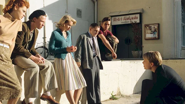 Photo du film : Le perroquet rouge