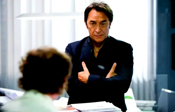 Photo 4 du film : Le Coach