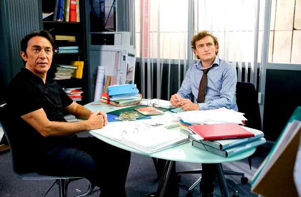 Photo 12 du film : Le Coach