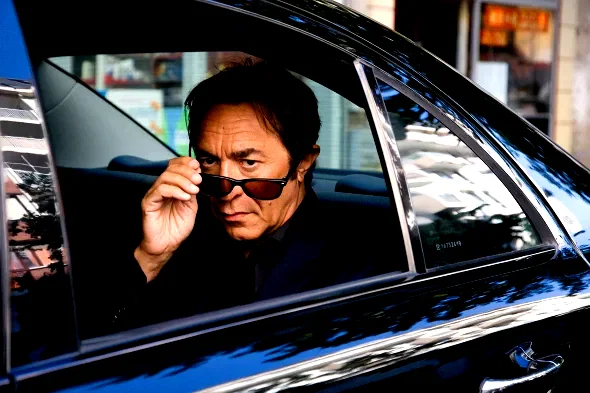 Photo 14 du film : Le Coach