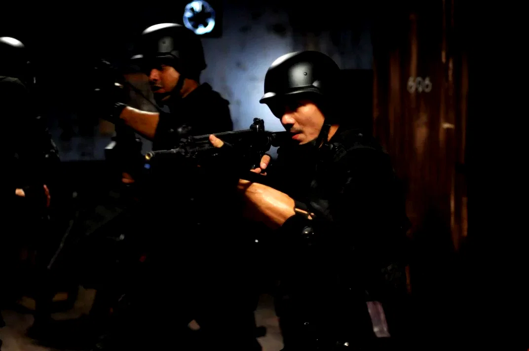 Photo 28 du film : The raid
