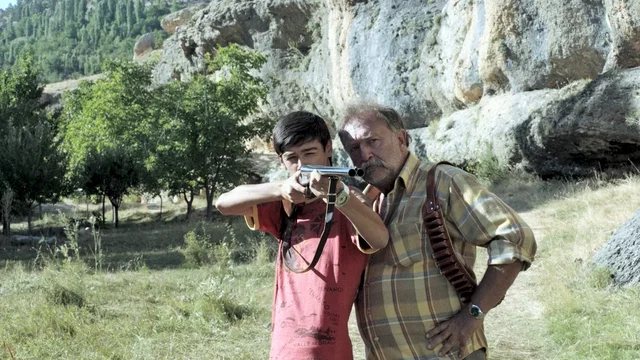 Photo du film : Derrière la Colline