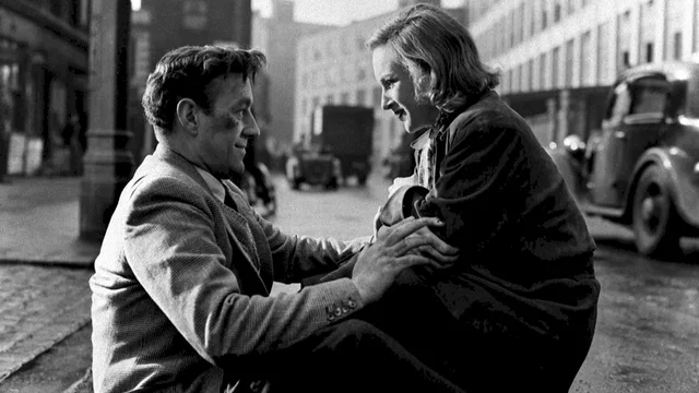 Photo du film : L'homme au complet blanc