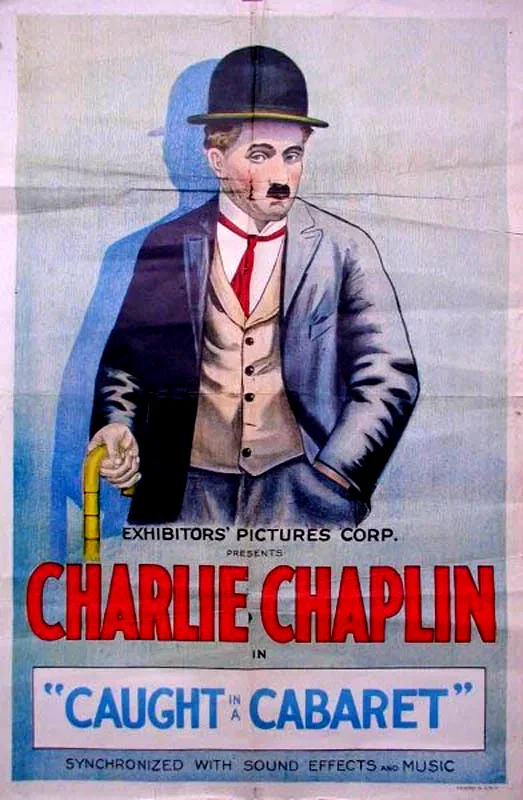 Photo 1 du film : Charlot Garçon de Café