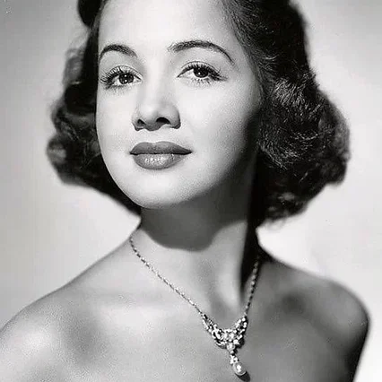  Olga San Juan