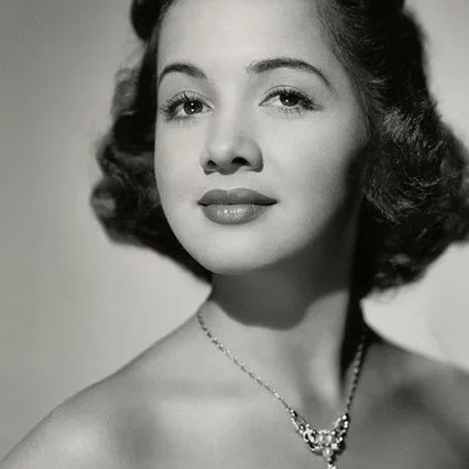  Olga San Juan